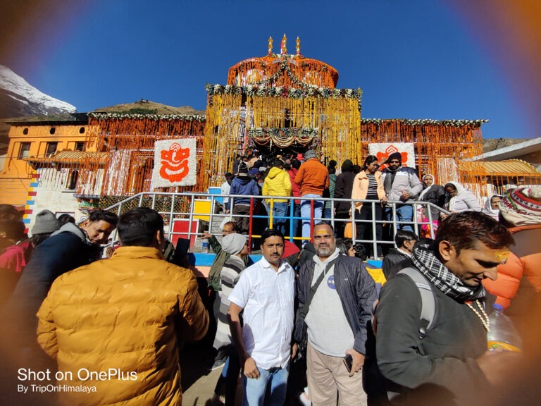 Sacred Kedarnath Temple surrounded by snow-capped mountains.