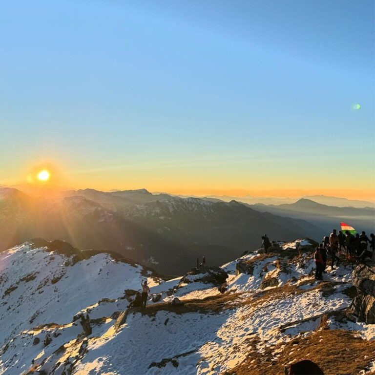 Crystal-clear sky with a view of the Kedarkantha Peak.