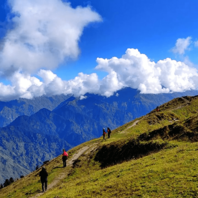 Group of trekkers walking along a scenic ridge trail with mountains in the background." Let me know if you'd like more suggestions!
