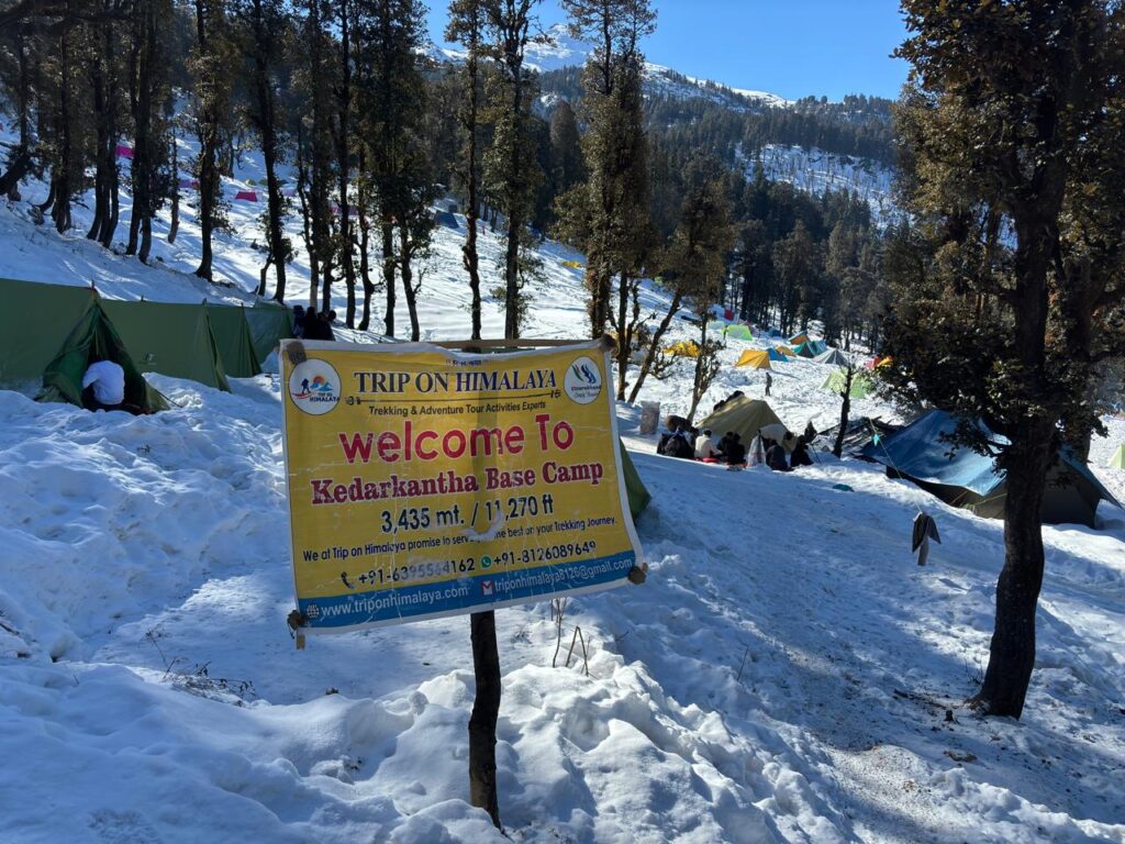 Kedarkantha Base Camp - Winter Trek in Uttarakhand Snow-covered Kedarkantha Base Camp with towering peaks in Uttarakhand